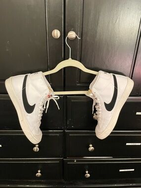 Nike White High-Top Sneakers with Black Swoosh Accent